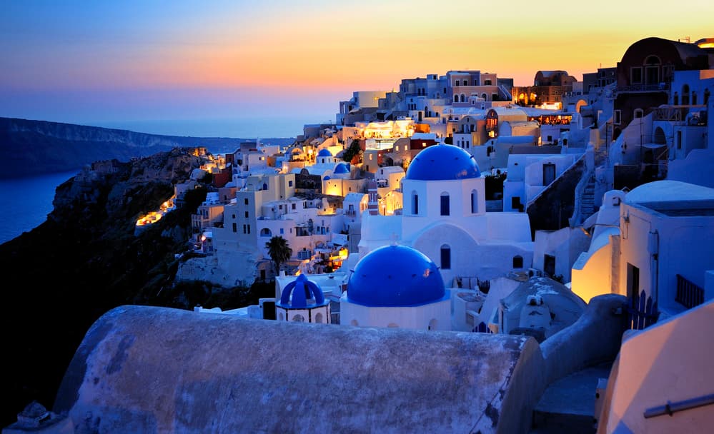 Santorini Blue Domes Sunset by Martin Froyda — canvas wall art
