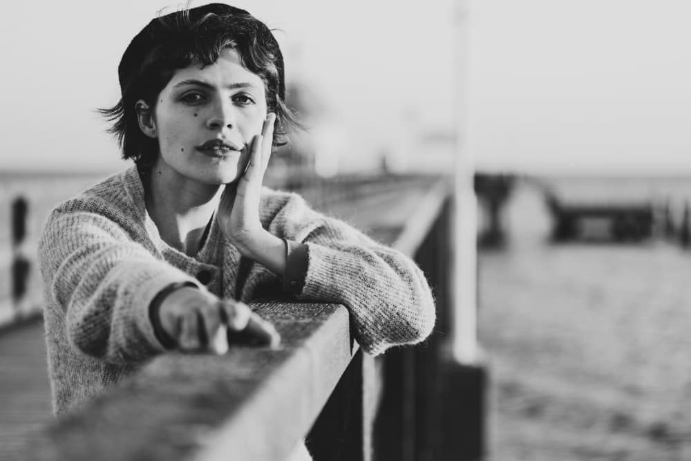 Thoughtful Woman On Pier by Markus Grimm — canvas wall art