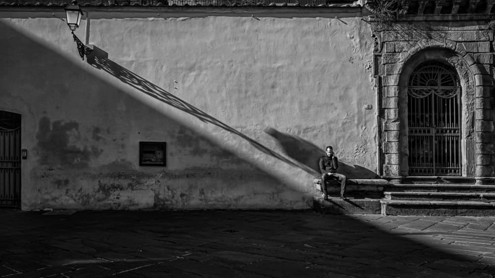 Lone Figure in Shadow by Luca Domenichi — canvas wall art