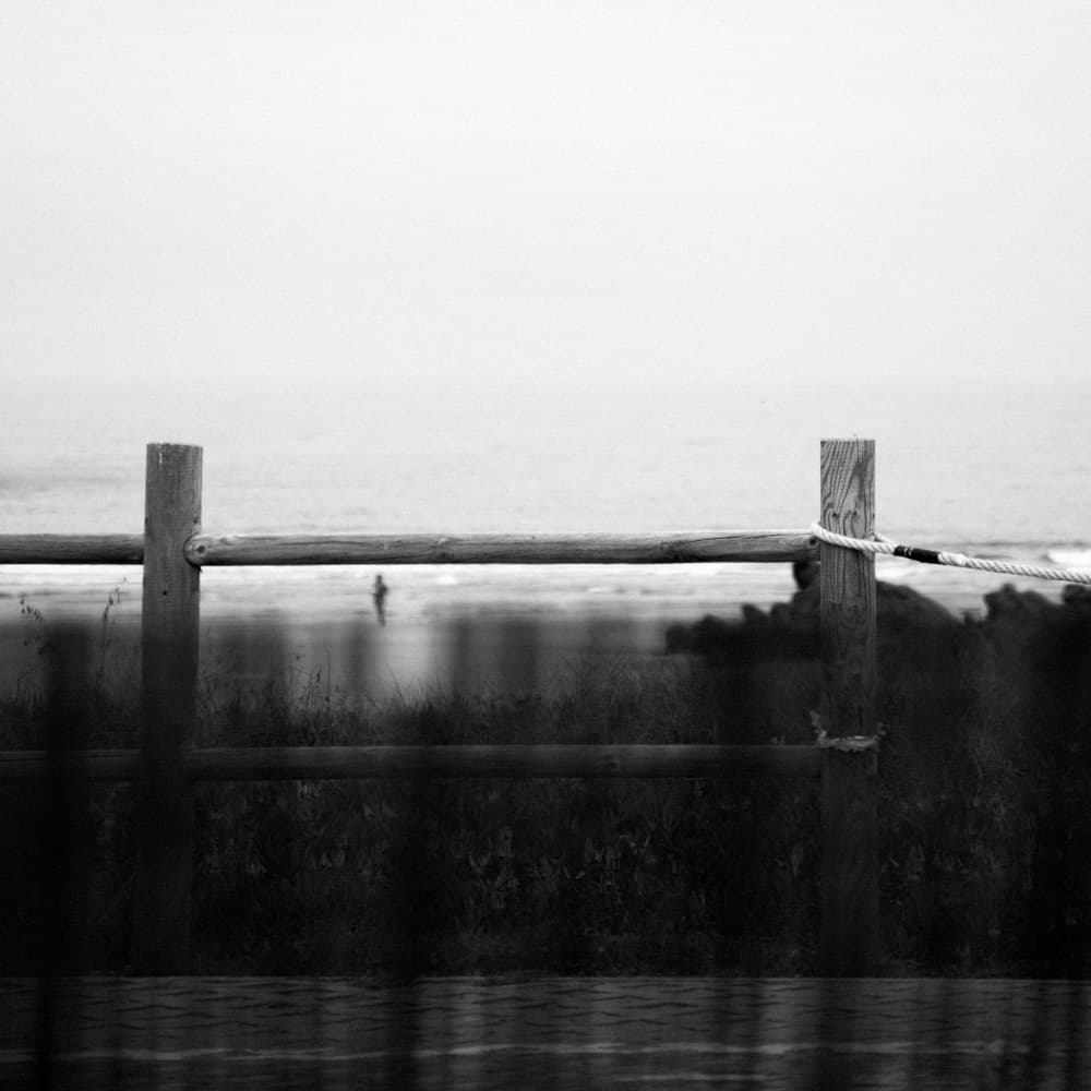 Misty Ocean Fence by Milena Seita — canvas wall art