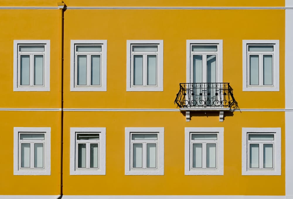 Vibrant Yellow Facade by wiebe wilbers — canvas wall art