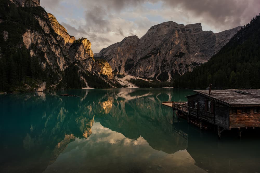 Majestic Alpine Lake Reflections by Marco Tagliarino — canvas wall art