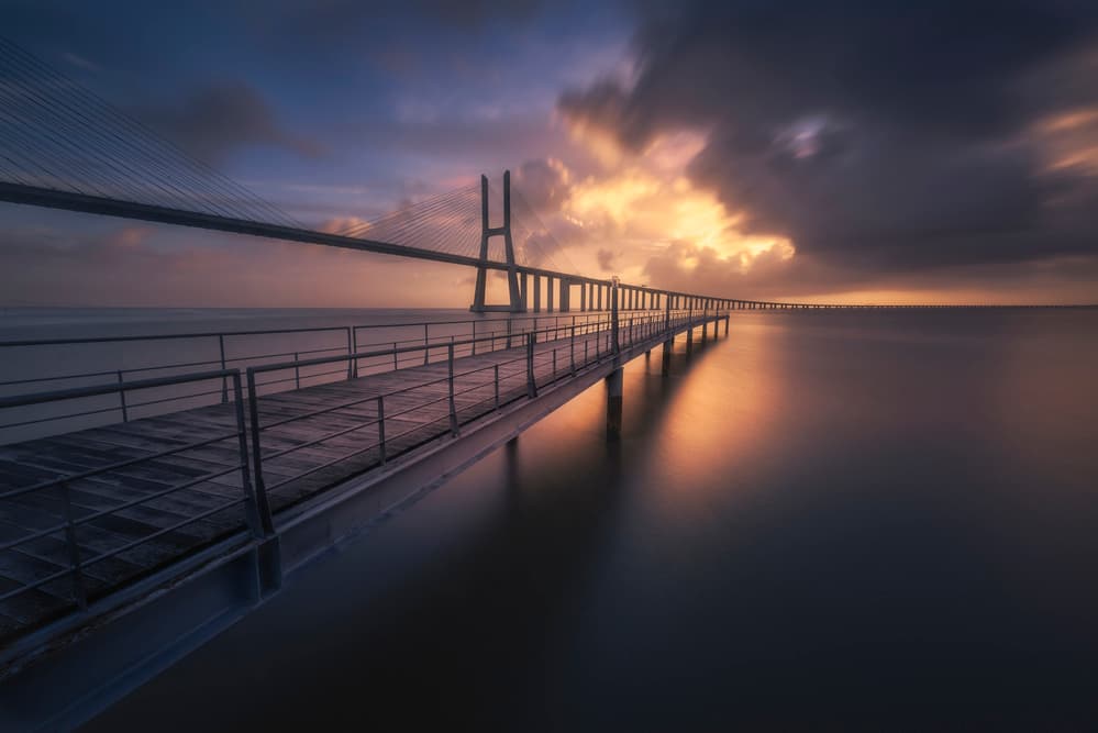Moody Bridge Sunset by Jorge Ruiz Dueso — canvas wall art