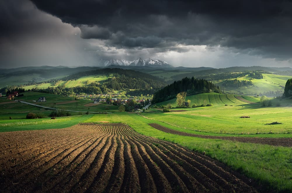 Stormy Mountain Fields Sunlight by Karol Nienartowicz — canvas wall art