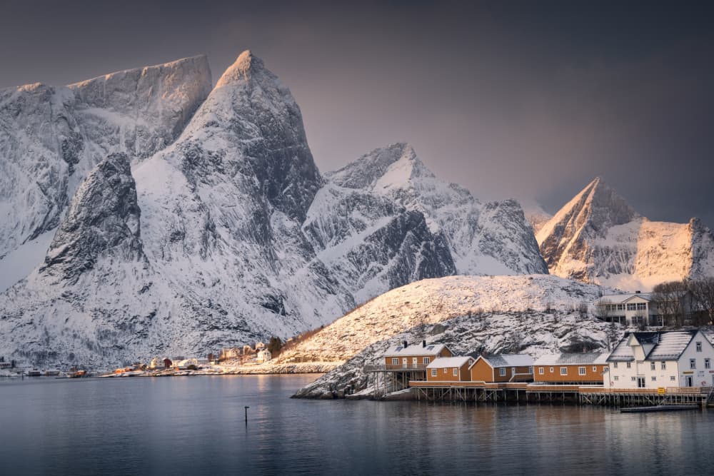Winter Fjord Village by Karol Nienartowicz — canvas wall art