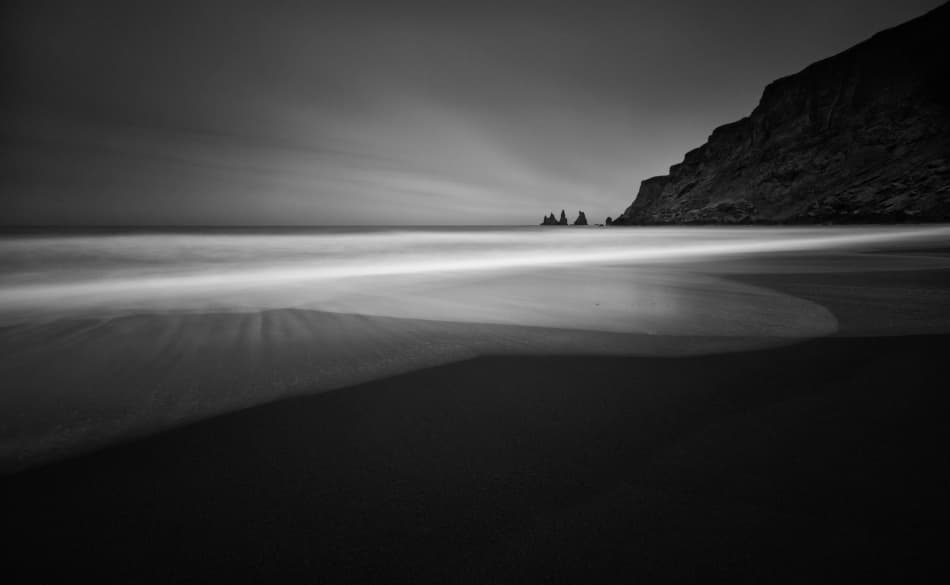 Serene Black Beach by Raymond Hoffmann — canvas wall art