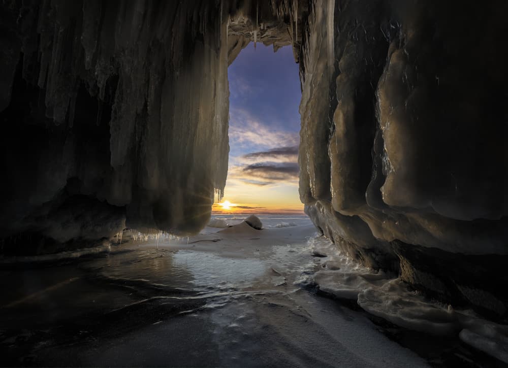 Ice Cave Sunset Glow by Wim Denijs — canvas wall art