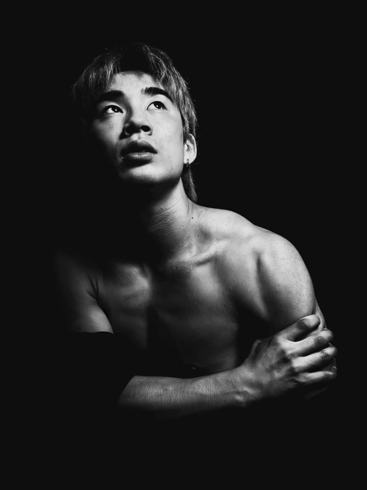 Muscular Man's Pensive Gaze by Eiji Yamamoto — canvas wall art
