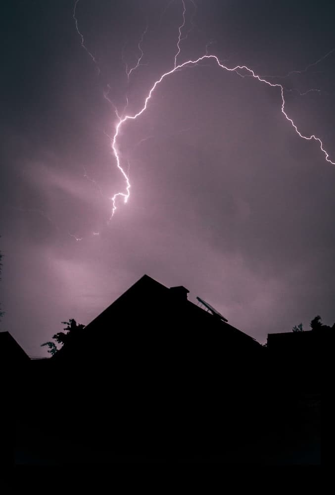 Lightning Over Dark Rooftops by Jakob Remar — canvas wall art