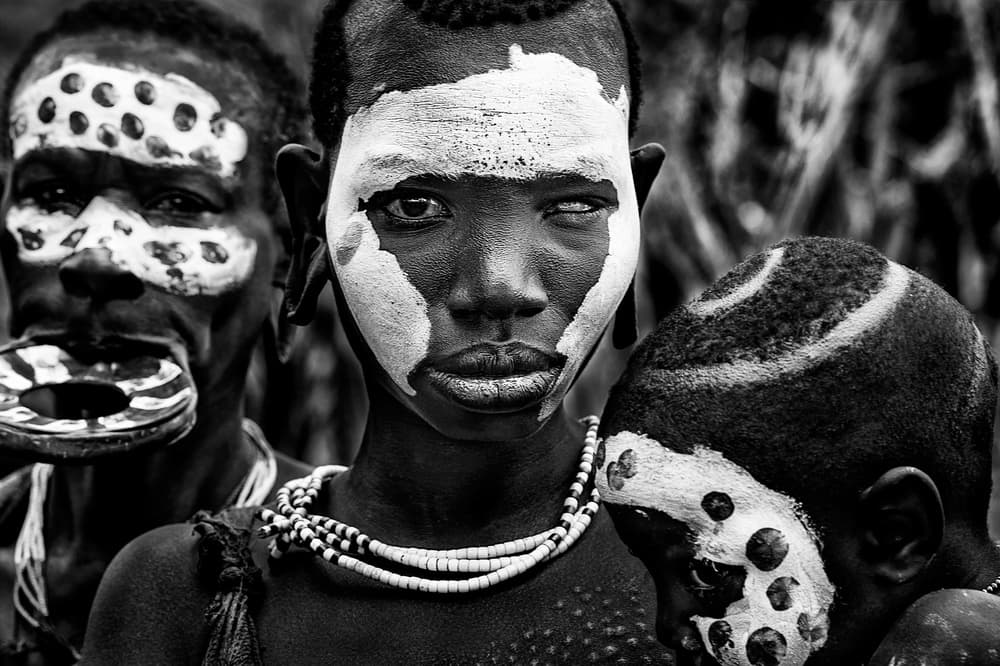 Painted Tribal Faces by Joxe Inazio Kuesta Garmendia — canvas wall art