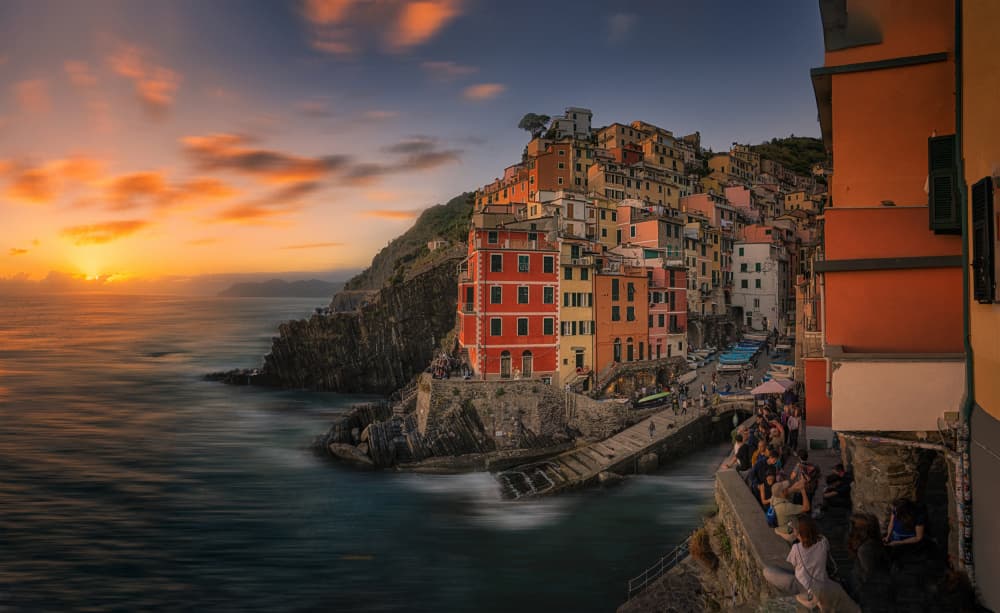 Colorful Coastal Village Sunset by Lydia Jacobs — canvas wall art