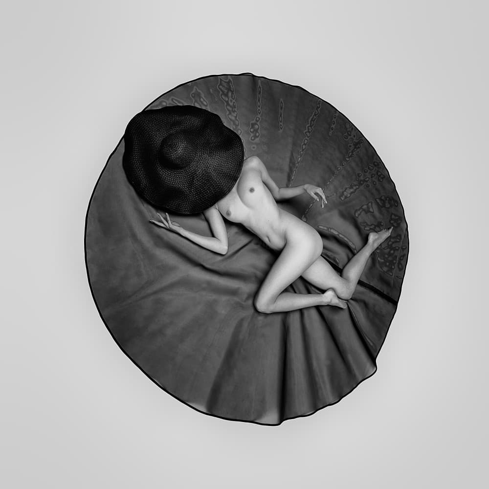 Elegant Nude Black Hat by Joan Gil Raga — canvas wall art