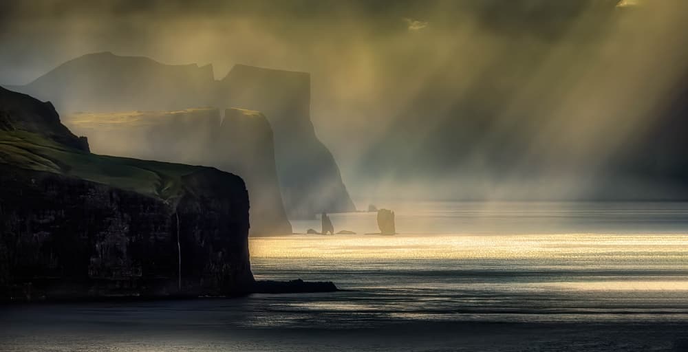 Misty Coastal Sun Rays by Wim Denijs — canvas wall art