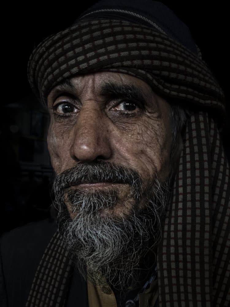Intense Gaze Old Man by Elena Molina — canvas wall art