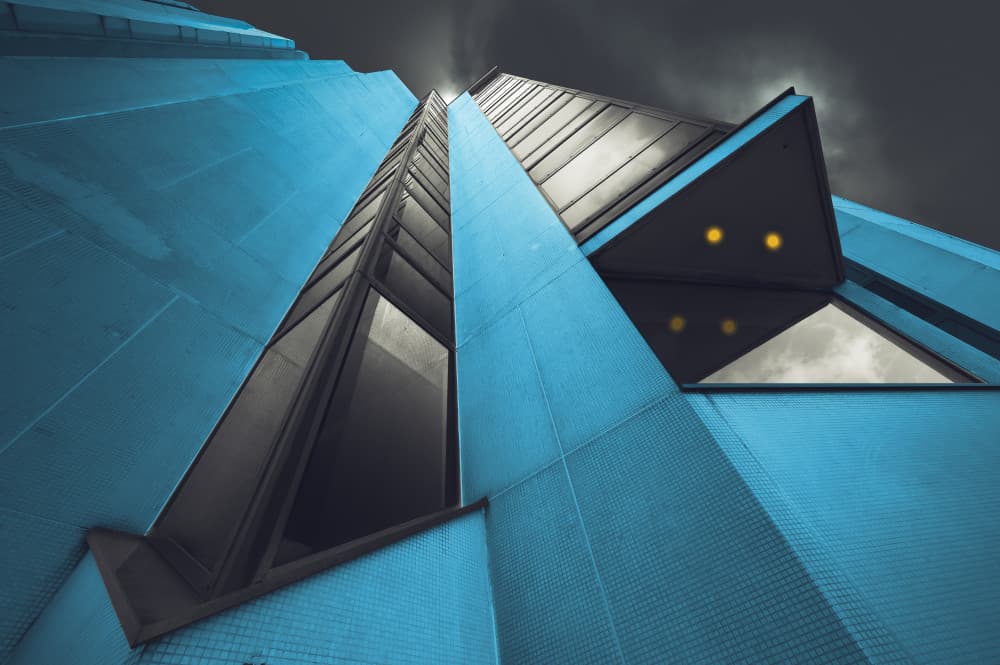 Soaring Blue Building by Marc Huybrighs — canvas wall art
