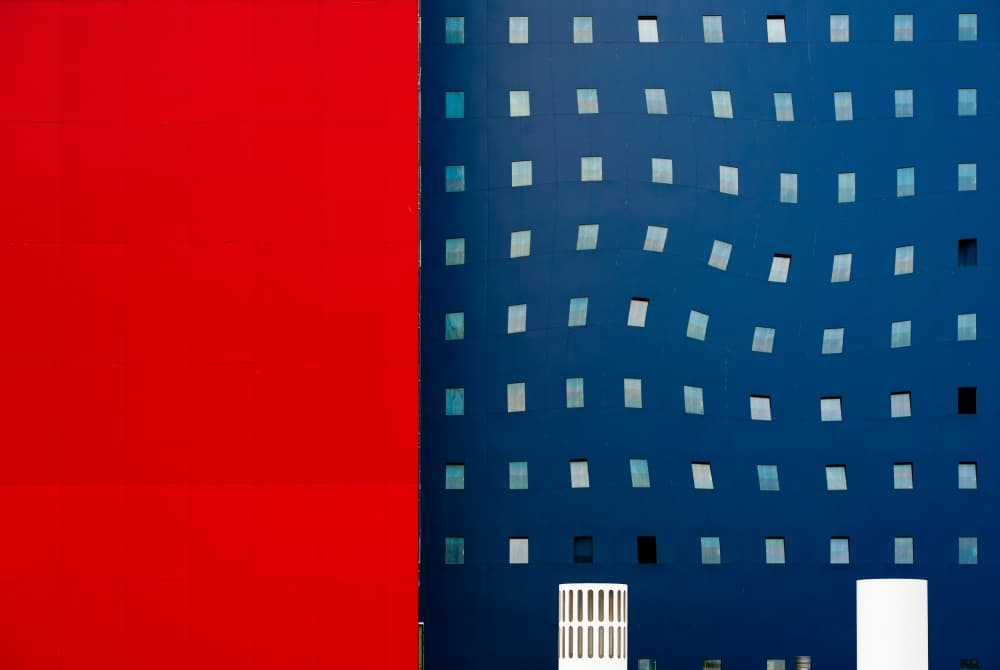 Red Blue Building Windows by Wayne Pearson — canvas wall art