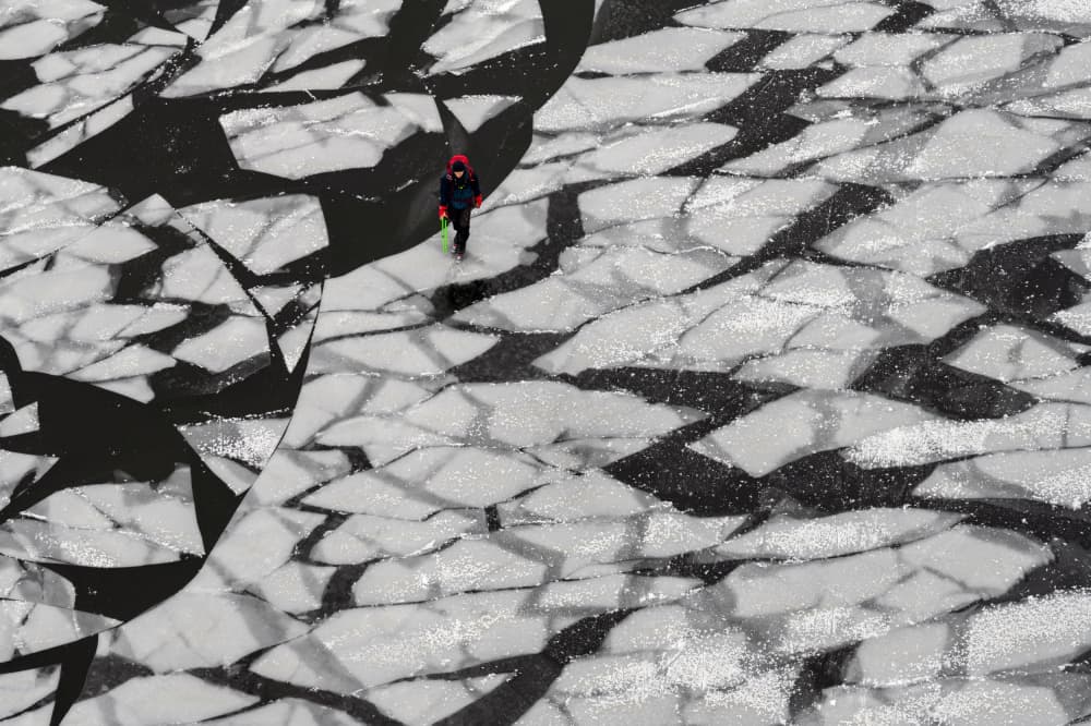 Child on Broken Ice by Karim Al Thahaby — canvas wall art