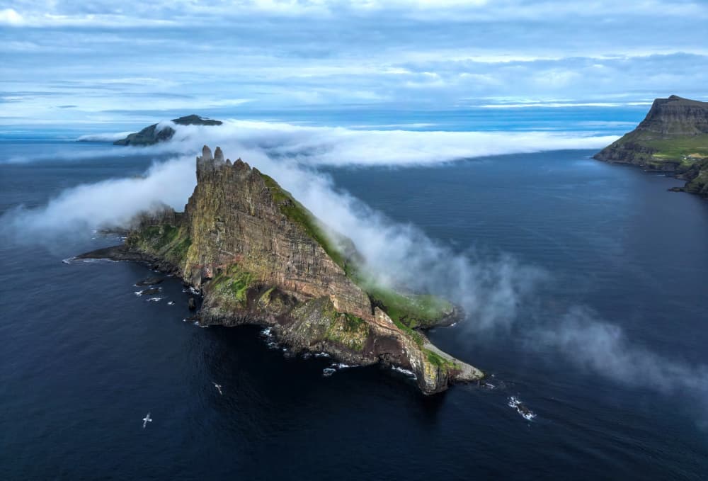 Misty Northern Sea Stacks by Jie Jin — canvas wall art