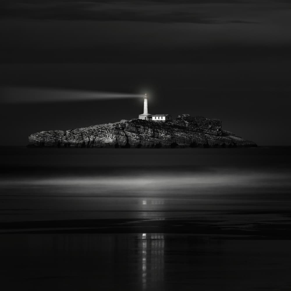 Island Lighthouse Guiding Light by Marco Antonio Cobo — canvas wall art