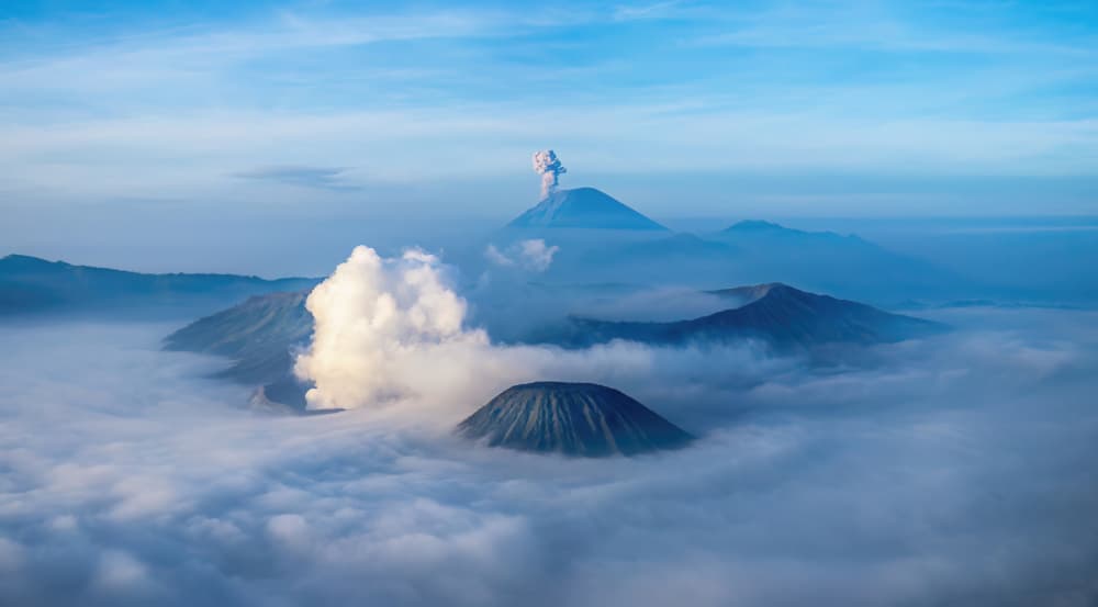 Volcanic Peaks Above Clouds by Jie Jin — canvas wall art