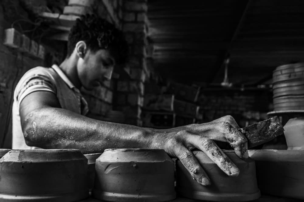 Potter's Working Hands by Hesham Ragab — canvas wall art