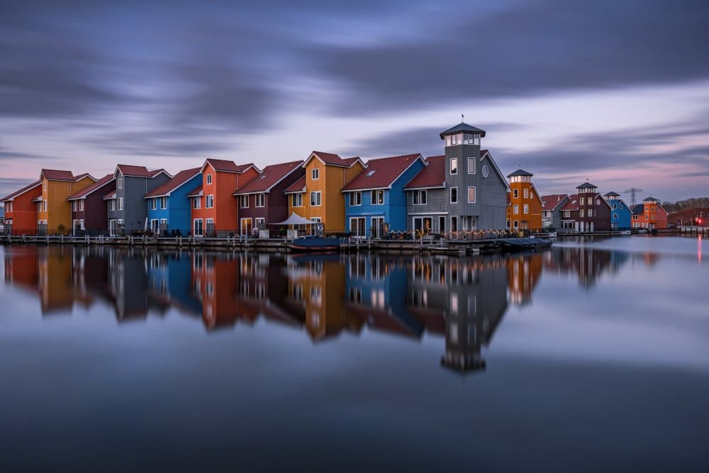 Colorful Waterfront Reflections by Oliver Isermann — canvas wall art