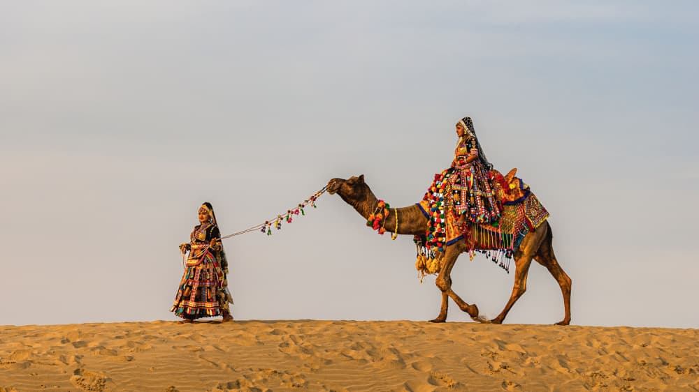 Traditional Desert Camel Ride by Hamza Qarooni — canvas wall art