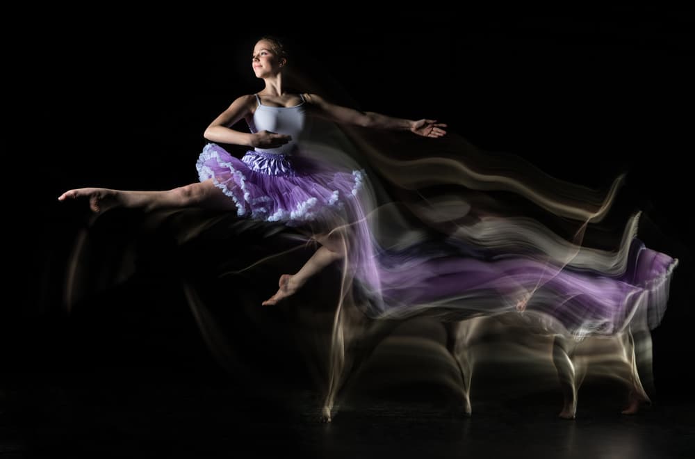 Ballerina's Purple Movement by Luc Stalmans — canvas wall art