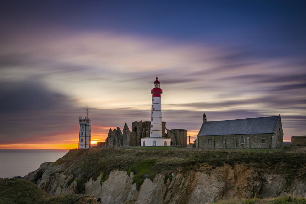 Lighthouse Cliff Sunset by JUAN CARLOS HERVÁS MARTÍNEZ — canvas wall art