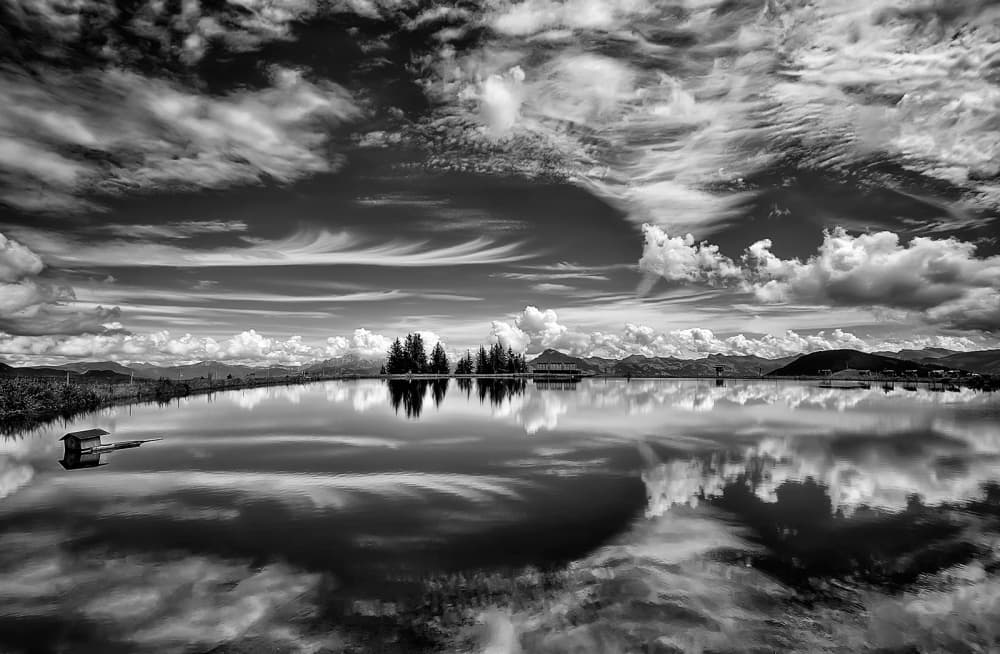Dramatic Lake Reflection by Aida Ianeva — canvas wall art