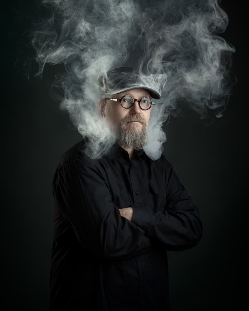 Pensive Smoke Portrait by Petri Damstén — canvas wall art
