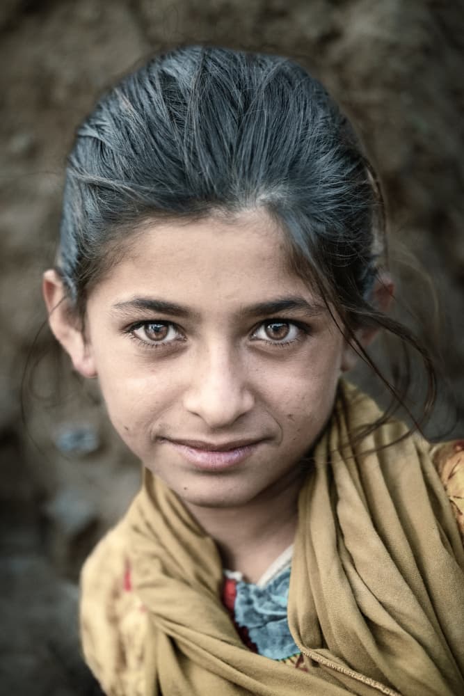Young Girl's Gentle Gaze by Trevor Cole — canvas wall art