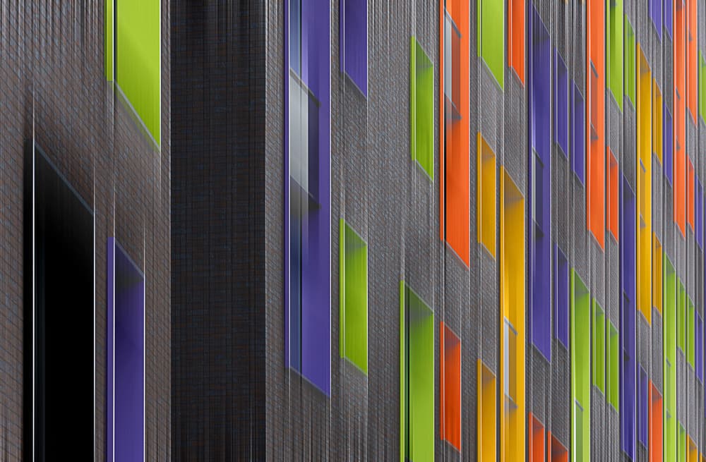 Vibrant Building Facade by Henk van Maastricht — canvas wall art