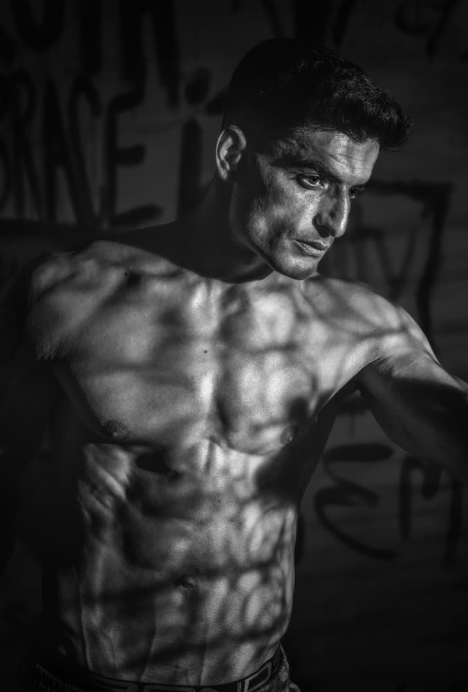 Muscular Man In Shadows by Irene Wu — canvas wall art