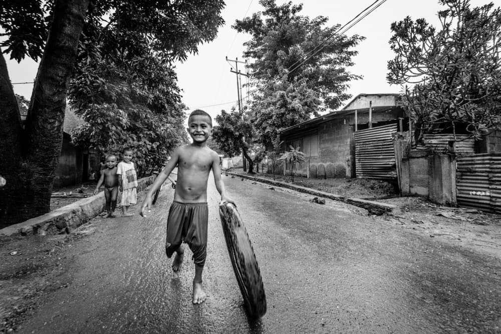 Joyful Barefoot Boy by Joao Galamba — canvas wall art