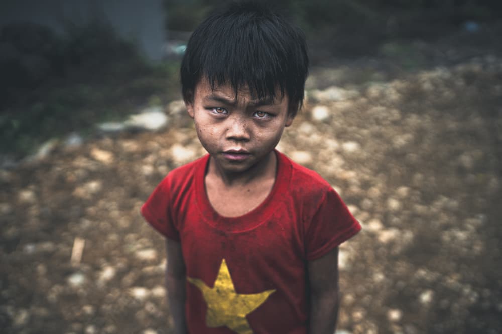 Somber Young Boy by Marco Tagliarino — canvas wall art
