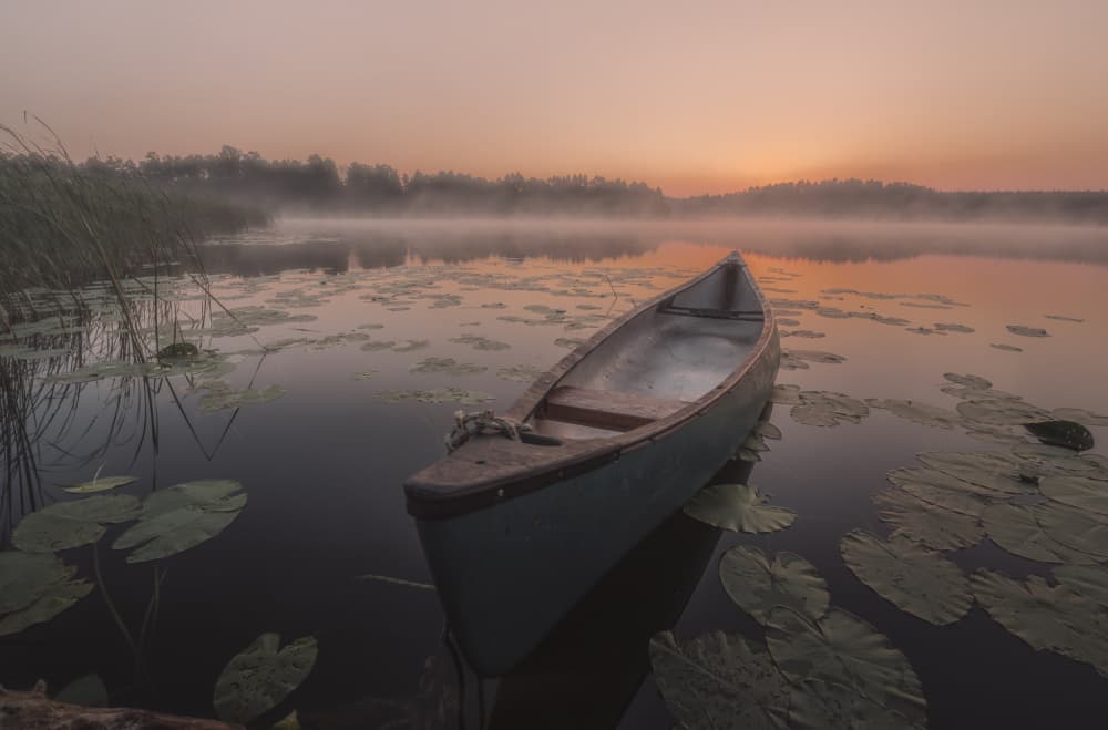 Misty Lake Boat Sunrise by Dariusz Budyta — canvas wall art