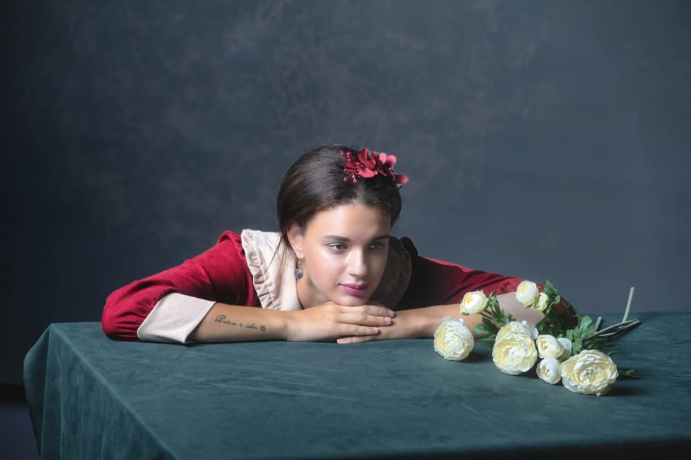 Pensive Woman with Flowers by Tali Stein — canvas wall art