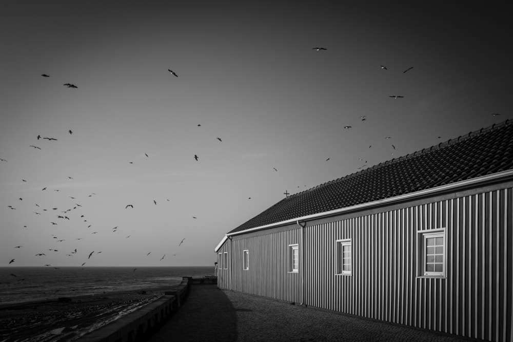 Coastal Church Flight by Luis Borges Alves — canvas wall art