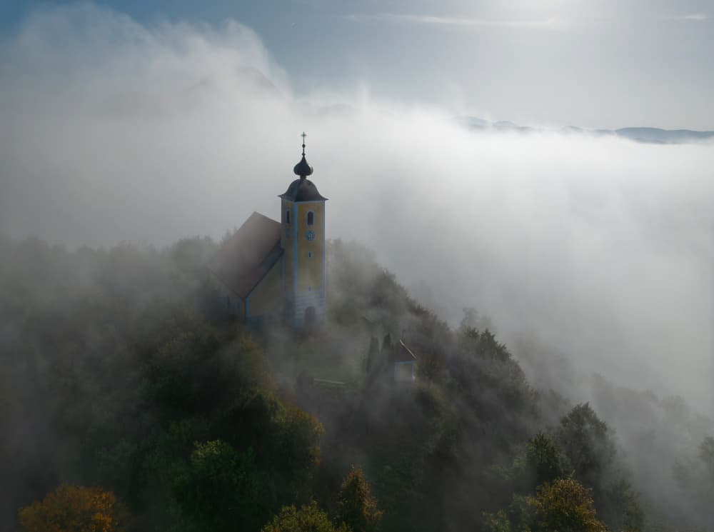 Church in the Clouds by Jure Kravanja — canvas wall art