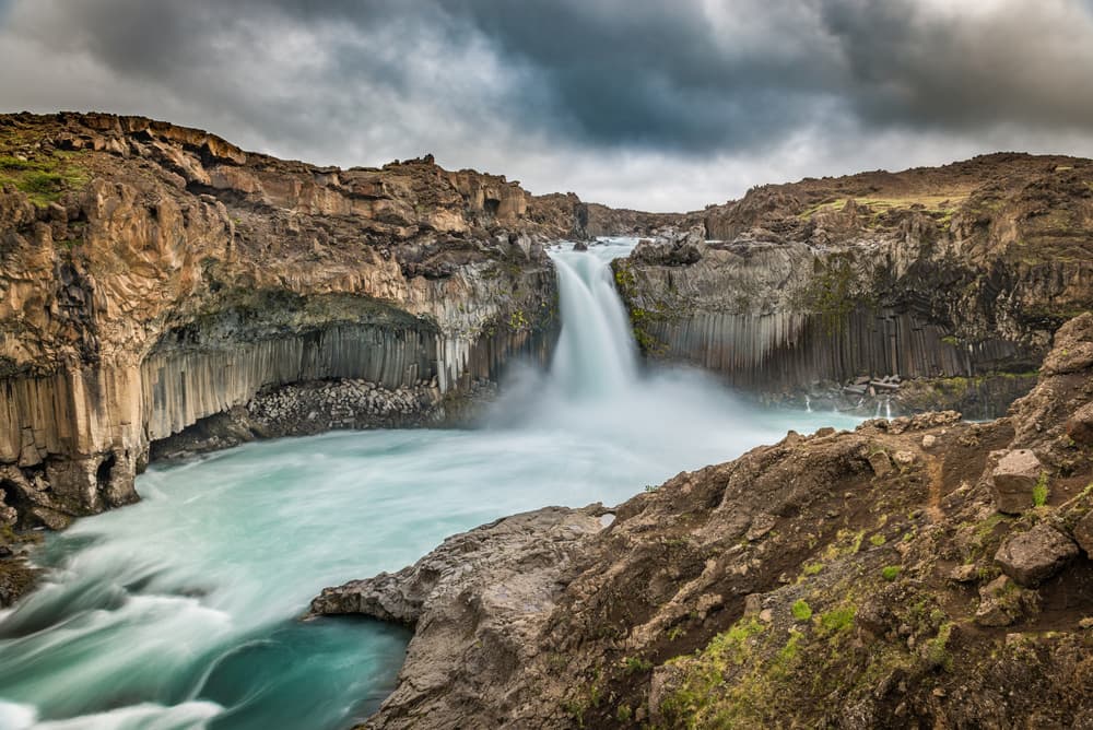 Powerful Basalt Waterfall by Jeffrey C. Sink — canvas wall art
