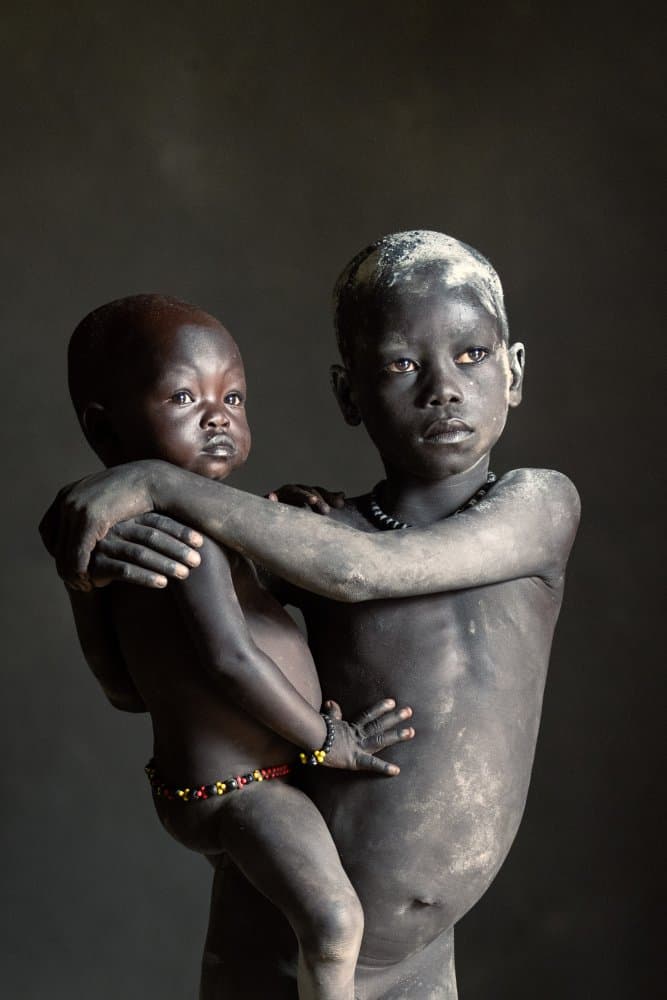 African Children's Embrace by Trevor Cole — canvas wall art