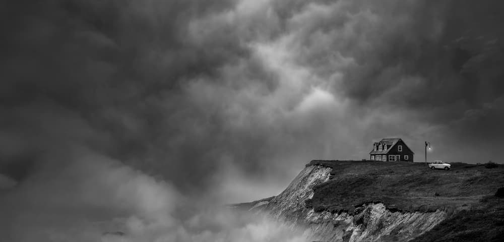 Stormy Cliffside House by David Senechal Photographie (polydactyle) — canvas wall art