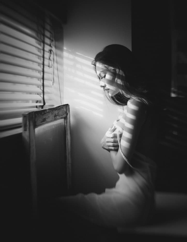 Pensive Woman by Window by ADIREK M — canvas wall art