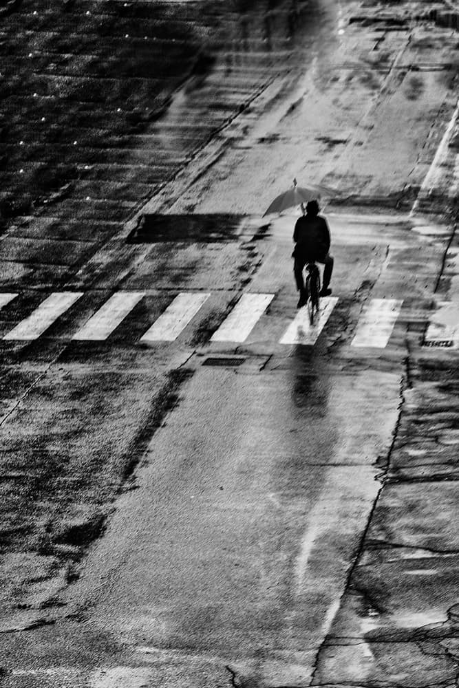 Rainy Day Cyclist by Massimo Della Latta — canvas wall art