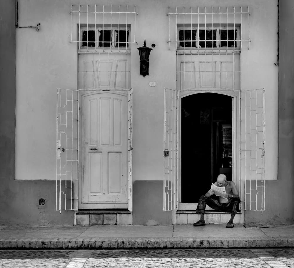 Man Reading Doorway by YASUTOSHI HONJO — canvas wall art