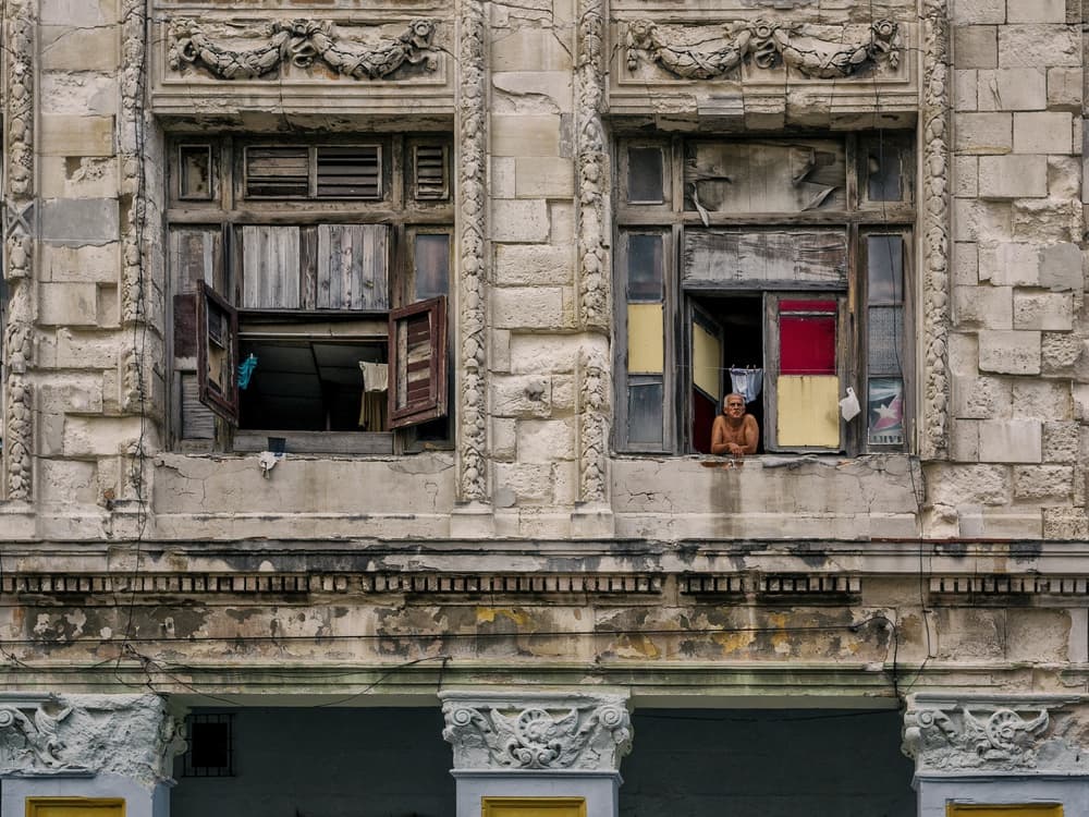 Man In Old Window by Pavol Stranak — canvas wall art