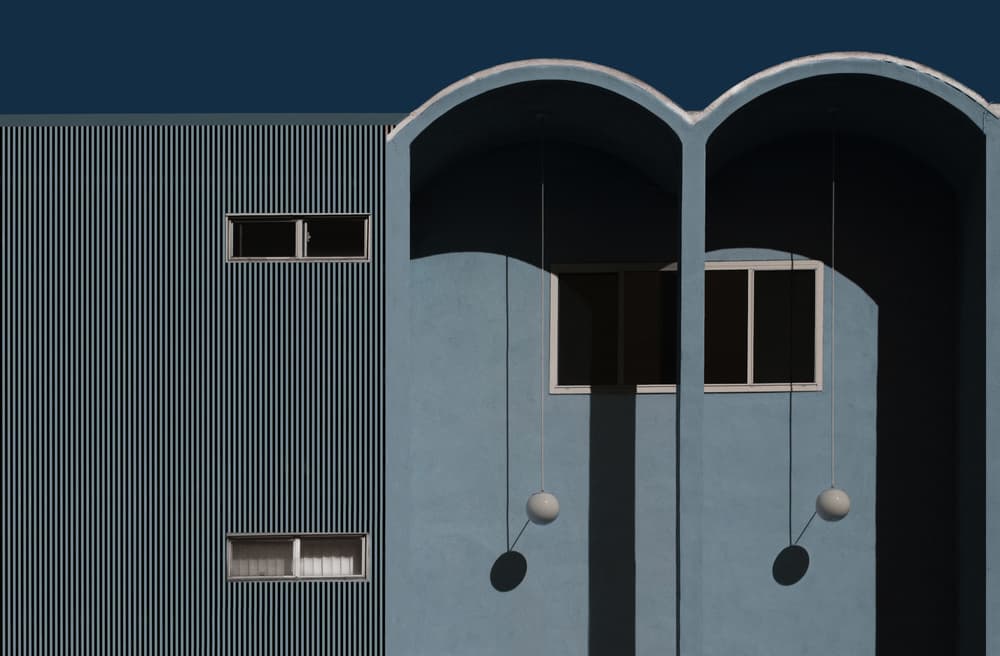 Blue Facade Shadows by Roxana Labagnara — canvas wall art