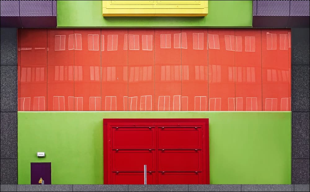 Vibrant Building Facade by Henk van Maastricht — canvas wall art