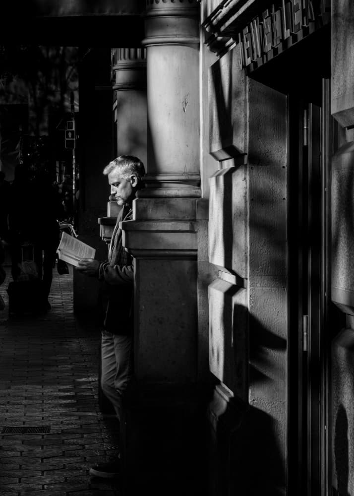 Contemplative Street Reading by Rudy Mareel — canvas wall art